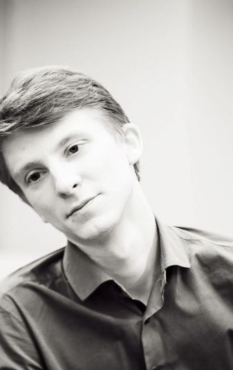 Михаил Комин
